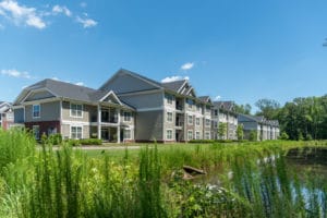 Pond with building in background