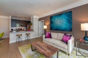 White couch on a brown wall